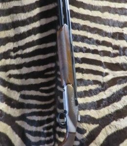 Fusil superposé BENELLI 828U silver cal.20/76 canon 71cm 5 chokes bande carbone, mallette