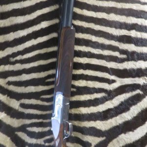 Fusil CAESAR GUERINI Invictus I Ascent TRAP acl.12/70 canons 76 cm 8 chokes bande 1/2 haute