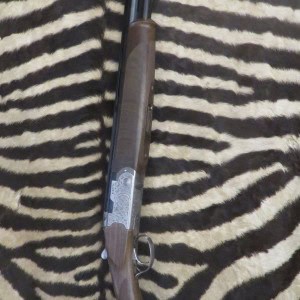 Fusil superposé BERETTA 686 SP1 Sporting B-Fast cal.12/76 ca.71 cm 5 chokes - mallette