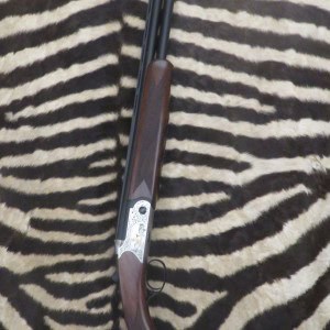 Fusil HUGLU Eagle Gravé Ergal cal.28/76 canons 71 cm 5 chokes - mallette